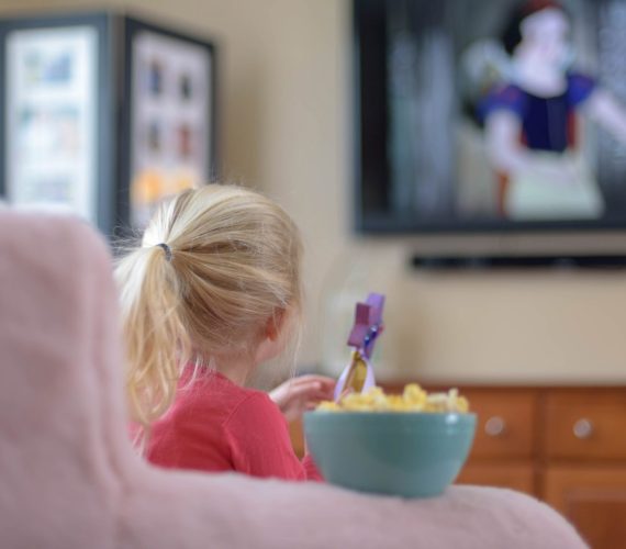 little-girl-watching-a-movie-on-tv-at-home-kid-kids-child-movie-night-children-tv-television-watching_t20_goLp0a